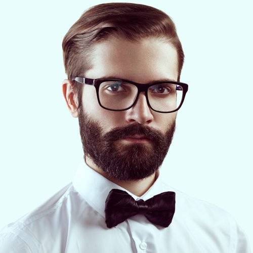 portrait-of-handsome-man-with-beard-e1618290484475.jpg